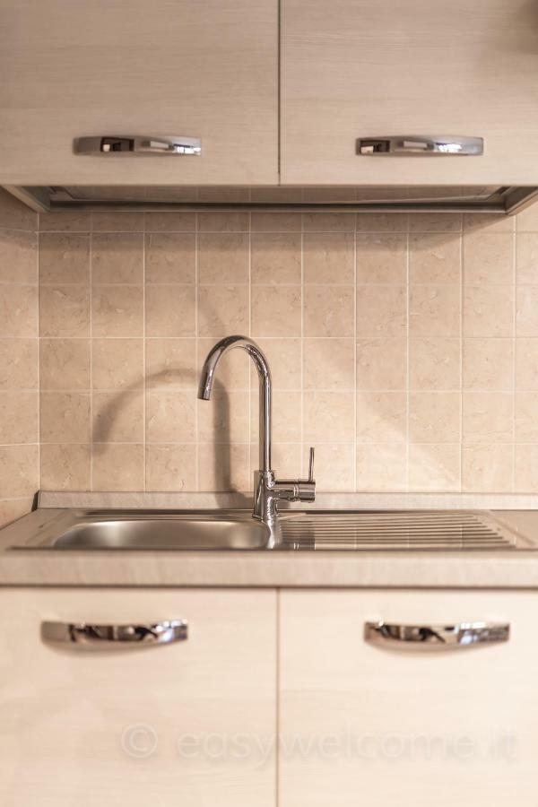 Easy Welcome Casa Rosada Apartment Nova Milanese Bagian luar foto