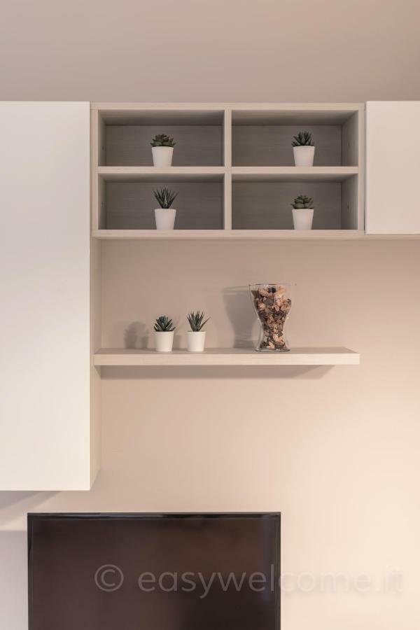 Easy Welcome Casa Rosada Apartment Nova Milanese Bagian luar foto