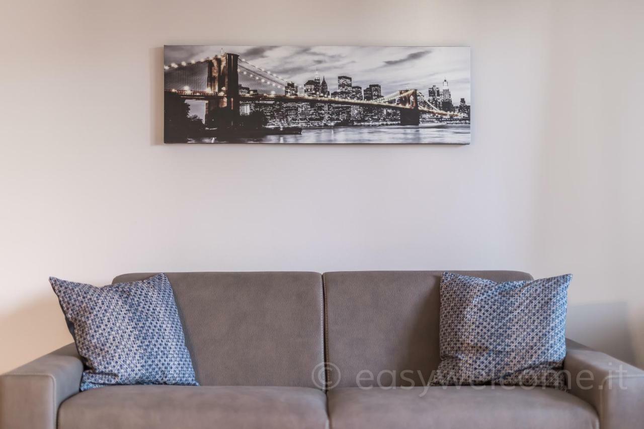 Easy Welcome Casa Rosada Apartment Nova Milanese Bagian luar foto