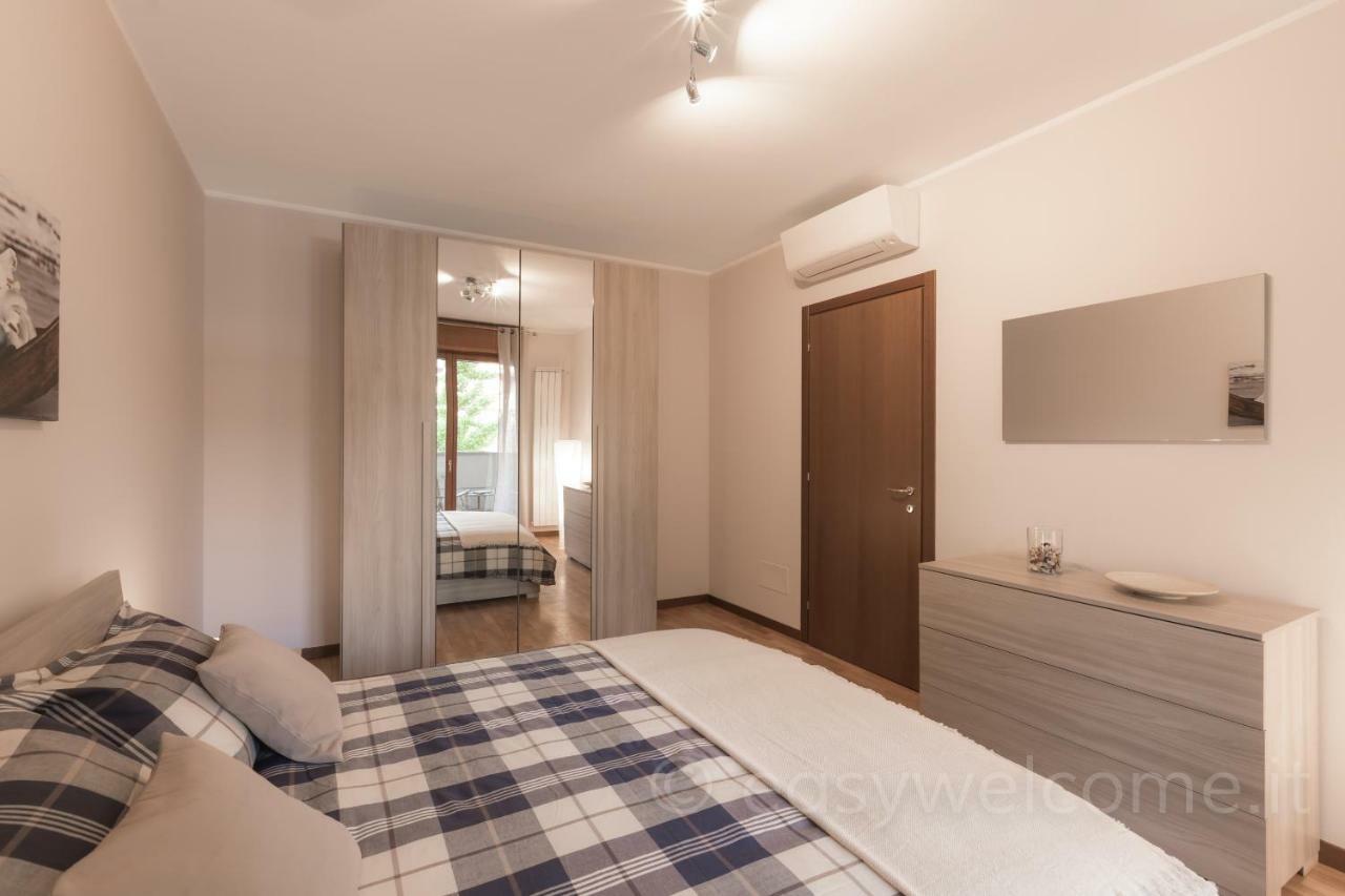 Easy Welcome Casa Rosada Apartment Nova Milanese Bagian luar foto