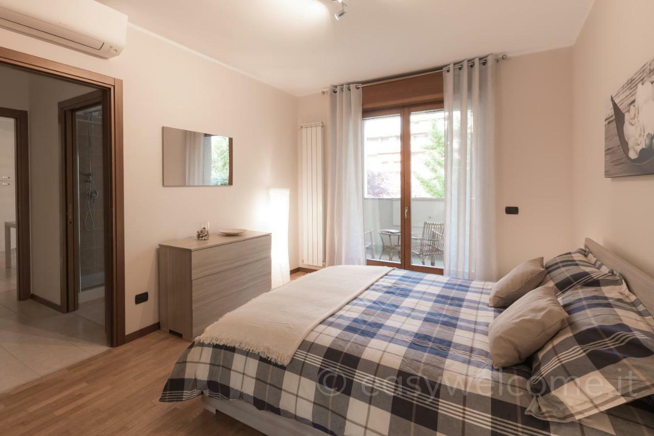 Easy Welcome Casa Rosada Apartment Nova Milanese Bagian luar foto