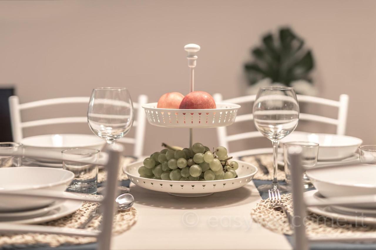 Easy Welcome Casa Rosada Apartment Nova Milanese Bagian luar foto
